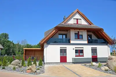 Image de Maison de vacances sur 2 étages, emplacement calme, à environ 1, 3 km de la plage de sable, Wi-Fi