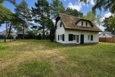 Image de Maison de vacances avec sauna, à environ 300 mètres de la plage de sable, Wi-Fi et machine à laver