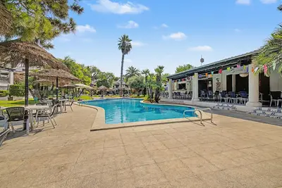 Image de Maison de vacances « Del Sol » avec piscine partagée, Wi-Fi et climatisation