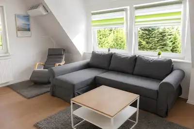 Image de Appartement « Wohnung Ostfriesenglück » avec Wi-Fi et climatisation