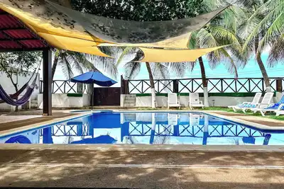 Image de Peaceful 4-bedroom beach house with Ac and private pool