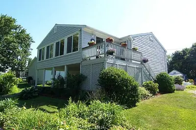 Maison de plage d'été en famille.
