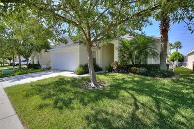 Image de Minutes de Disney - Beautiful 3/2 Pool Villa avec WiFi Ă Hampton Lakes