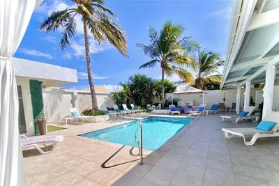 Image de Suite de luxe Palm Beach Ă 5 minutes Ă pied de la plage et de l'hĂ´tel Marriott