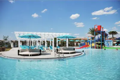 Image de Chauffage Gratuit Du Spa * Parc aquatique, Lazy River, Arcade, Bar, gymnase, WiFi * CĂ´te Ă cĂ´te