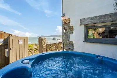 Image de Luxueux et romantique Beach Front Cottage à Charlestown avec HotTub & Log Burner