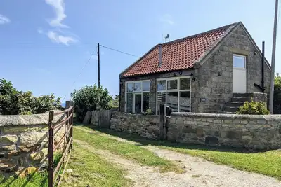 Image de Magnifique chalet au sommet d'une falaise avec vue imprenable sur la mer