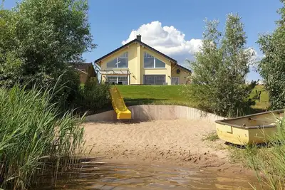 Image de La plage privée! Maison \"sans nuages\" avec cheminée et sauna directement sur la plage