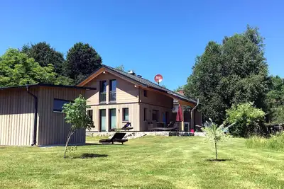 Image de Luxueuse maison en bois massif avec piscine et sauna pour 4 personnes à Allgäu