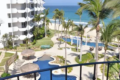 Image de Étapes de la plage, condo de style resort