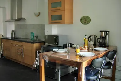 Image de Appartement chaleureux au cœur de la cité des images
