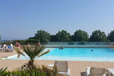 Image de Appartement 2 pièces Résidence Piscine Clim Parking 300 m Plage Juan les Pins