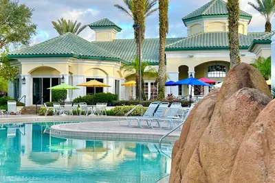 Image de 6-103 Gated Resort, cabines au bord de la piscine, salle de jeux, salle de sport, piscine chauffée, près de Disney