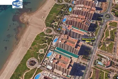 Image de Appartement au 1er ligne de mer à Marina d'Or avec pelouse et plage [Famille]