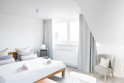 Image de Se lever avec appartement de style Seeblick avec vue sur la montagne et le lac à Lindau