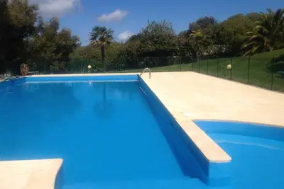 Image de 2 pieces Rez de jardin vue mer dans residence de standing avec piscine