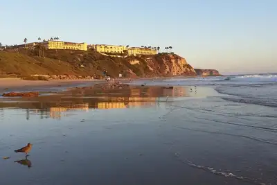 Image de Une Étapes Chambre de Beach Condo