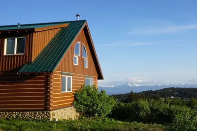Cabane en rondins personnalisée avec une vue imprenable - idéale pour les couples et les familles!
