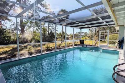 Image de Lakefront 3 chambres 2 salles de bain avec piscine chauffée Accueil près de Siesta Key Beach