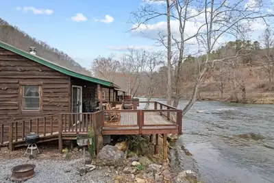 Image de * The Great Escape * Cabane paisible en bord de rivière avec une vue imprenable! Foyer et Wifi