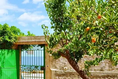 Image de Maison de jardin sur les plus grandes plages de Taormina appart. n 2 pour 4 personnes