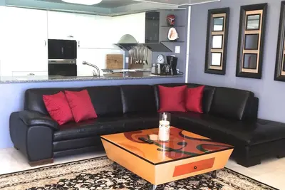 Image de ** Unité de coin face à l'océan avec véranda enveloppante avec 2 lits queen tempurpedic **