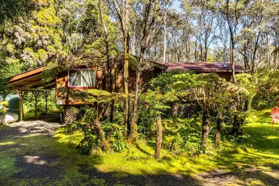 Image de Cabine confortable dans le village du volcan à quelques minutes de l'entrée du parc du volcan.