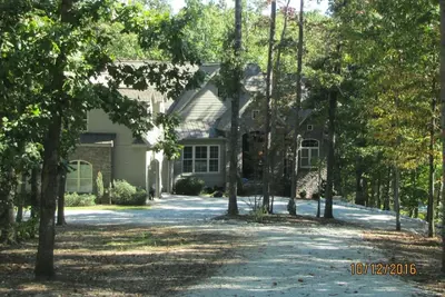 Image de Front de lac, calme, crique privée sur 4. 75 acres, canoë, 2 kayaks, quais de bateau