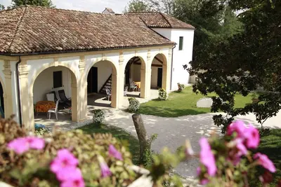 Image de Magnolia, résidence de charme dans le Barchessa de Venetian Villa: Villa Pastori