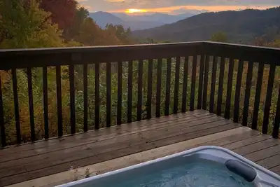 Image de Belle cabane en rondins-cadre privé-Wifi-bain à remous-vues impressionnantes