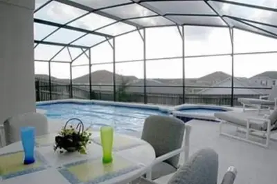 Image de Réservez 7 nuits ou plus ÉCONOMISEZ 5% - 4 chambres 3 salles de bain, salle de jeux, piscine / spa prvt