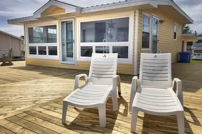Image de Cottage par la mer, avec plage privée.