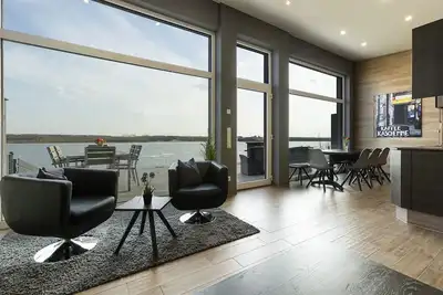 Image de Maison De Vacances Avec Plage, Bateau, Sauna, Climatisation Et Foyer!