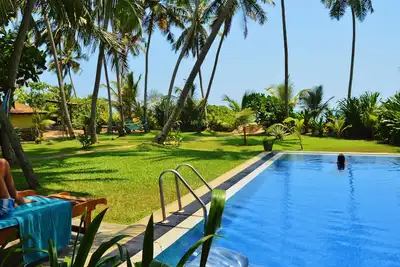 Image de Beach Villa - piscine parfaite - grande jardin - le personnel est formidable. Pure Paradise!