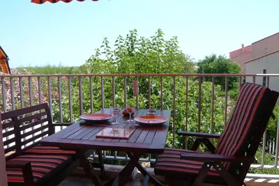 Image de Agréable appartement avec terrasse, petite vue mer