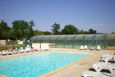 Image de Grand cottage meublé avec terrasse couverte et place de parking