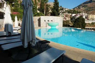 Image de Magnifique appartement à Taormina avec piscine, à 5 minutes du théâtre grec
