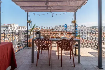 Image de At 20 mt from the sea cozy panoramic penthouse for families with bike box and wifi
