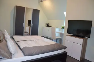 Image de Appartement de vacances récemment construit dans un style campagnard moderne. 10 min piste cyclable jusqu'à la plage