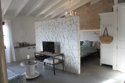Image de Appartement Loft complet, Ă 5 min. des plages, avec Ac, Wifi, Tv satellite. .