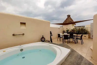 Image de Penthouse du centre-ville près de la plage