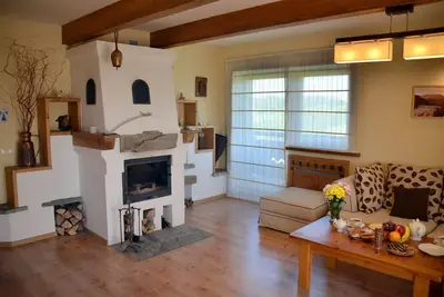 Image de Appartement de style régional de 89 m² avec une vue imprenable sur les montagnes des Tatras.