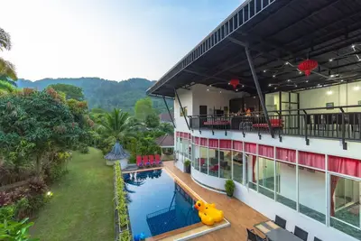 Image de Piscine privée Villa Tropical Living avec des vues Mouatin
