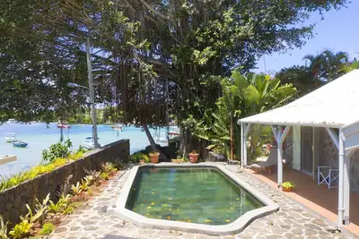 Image de Villa privée pied dans l’eau piscine, jardin, femme de ménage, wifi gratuit