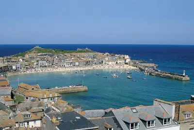 Image de The Stones Luxury Apartment avec vue imprenable sur la mer et parking privé
