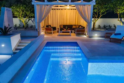 Image de Appartement de luxe 4 * Giovanni avec piscine chauffée