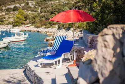 Image de Appartement confortable Bose 2 + 2 à seulement 5 mètres de la plage dans un endroit calme pour se détendre