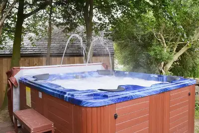Image de Chalet de luxe 5 * avec bain à remous / sauna / Wifi / Sky, jardin clos et animaux acceptés