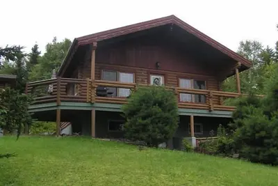 Image de Maison en rondins avec une vue panoramique fantastique