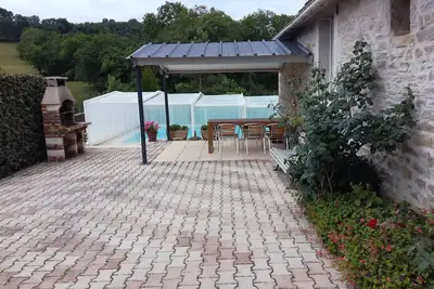 Image de Gîte à la campagne avec sa piscine privée et couverte proche de Rocamadour